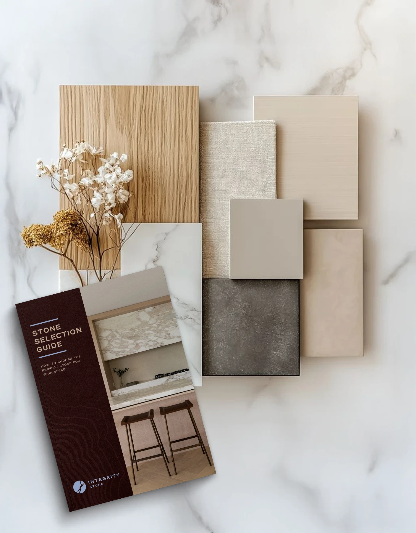 Integrity Stone benchtop samples and guide for luxury stone worktops, Gold Coast/Mudgeeraba, on marble surface.